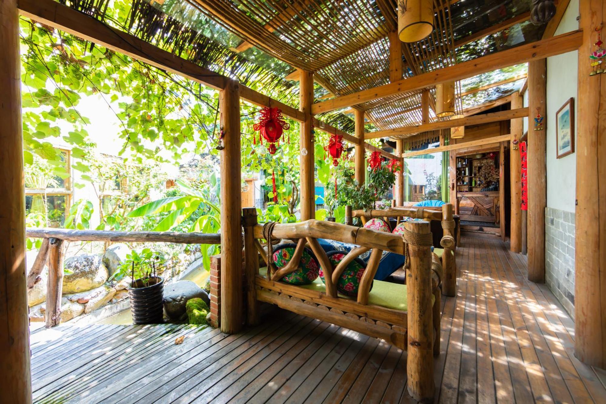 Butterfly Flowers Inn จางเจียเจี้ย ภายนอก รูปภาพ