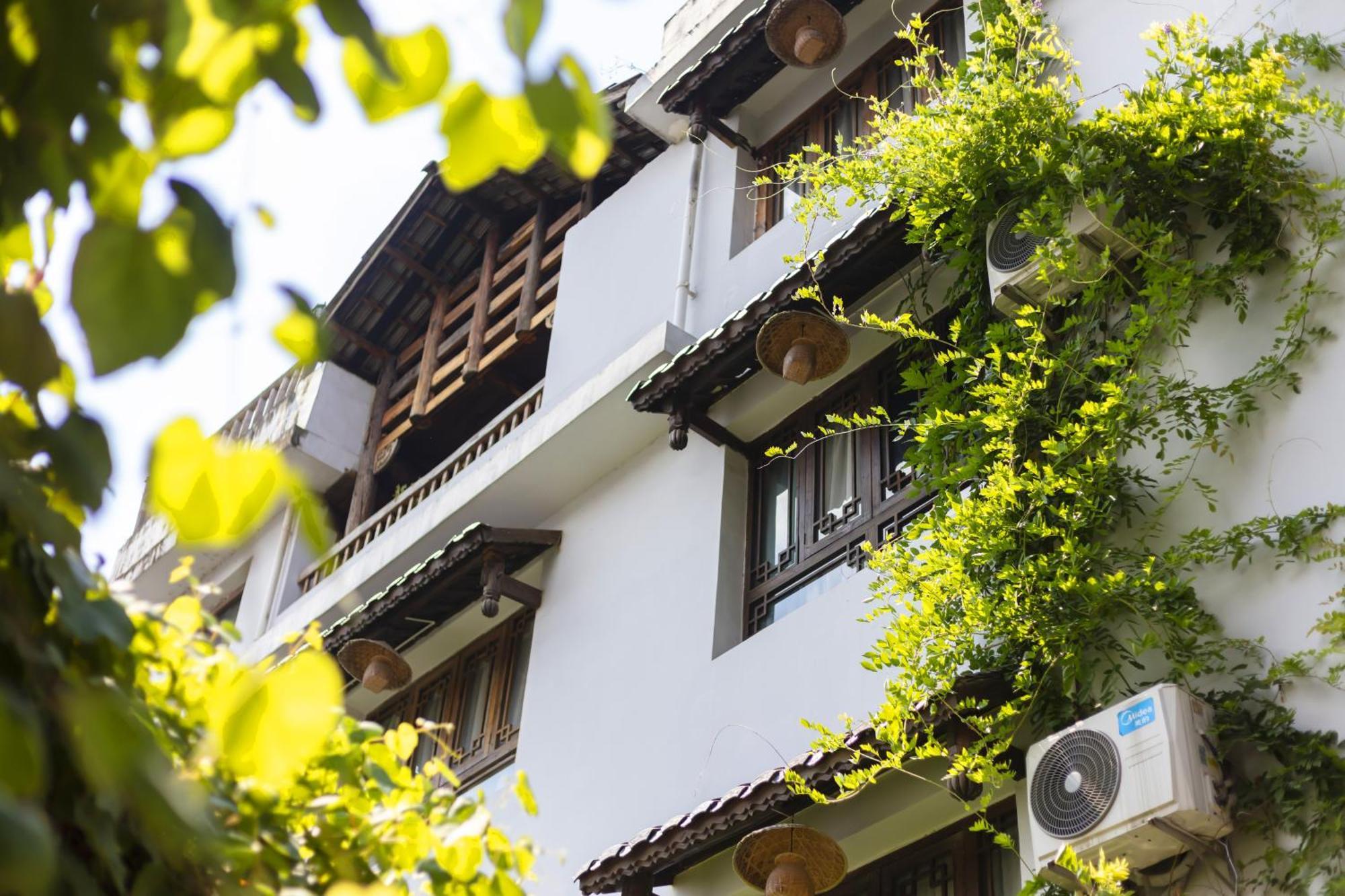Butterfly Flowers Inn จางเจียเจี้ย ภายนอก รูปภาพ