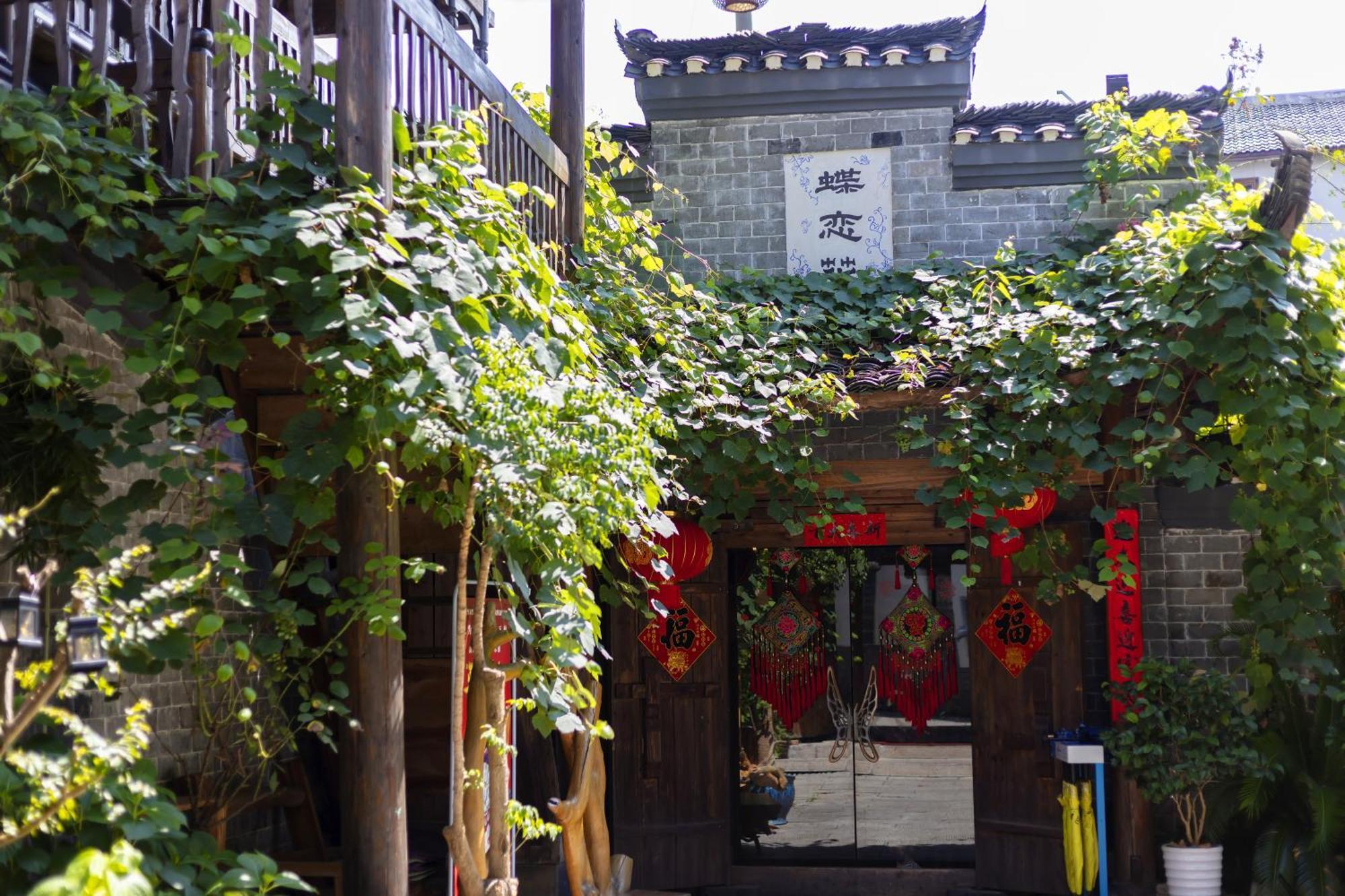 Butterfly Flowers Inn จางเจียเจี้ย ภายนอก รูปภาพ