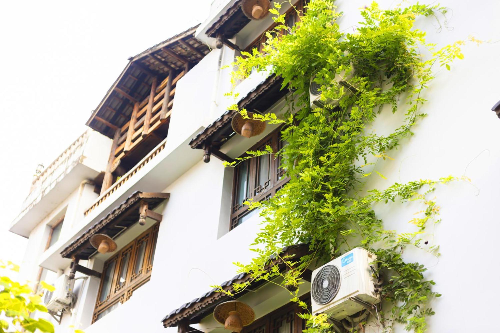 Butterfly Flowers Inn จางเจียเจี้ย ภายนอก รูปภาพ