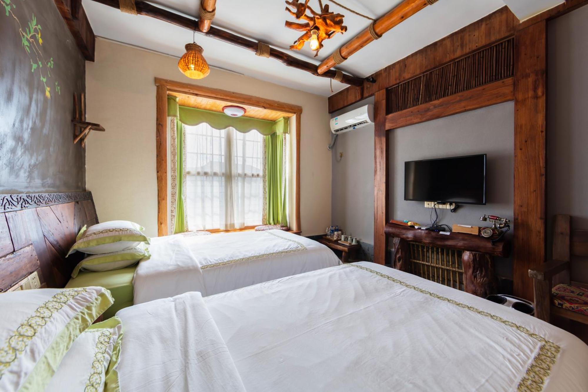 Butterfly Flowers Inn จางเจียเจี้ย ภายนอก รูปภาพ