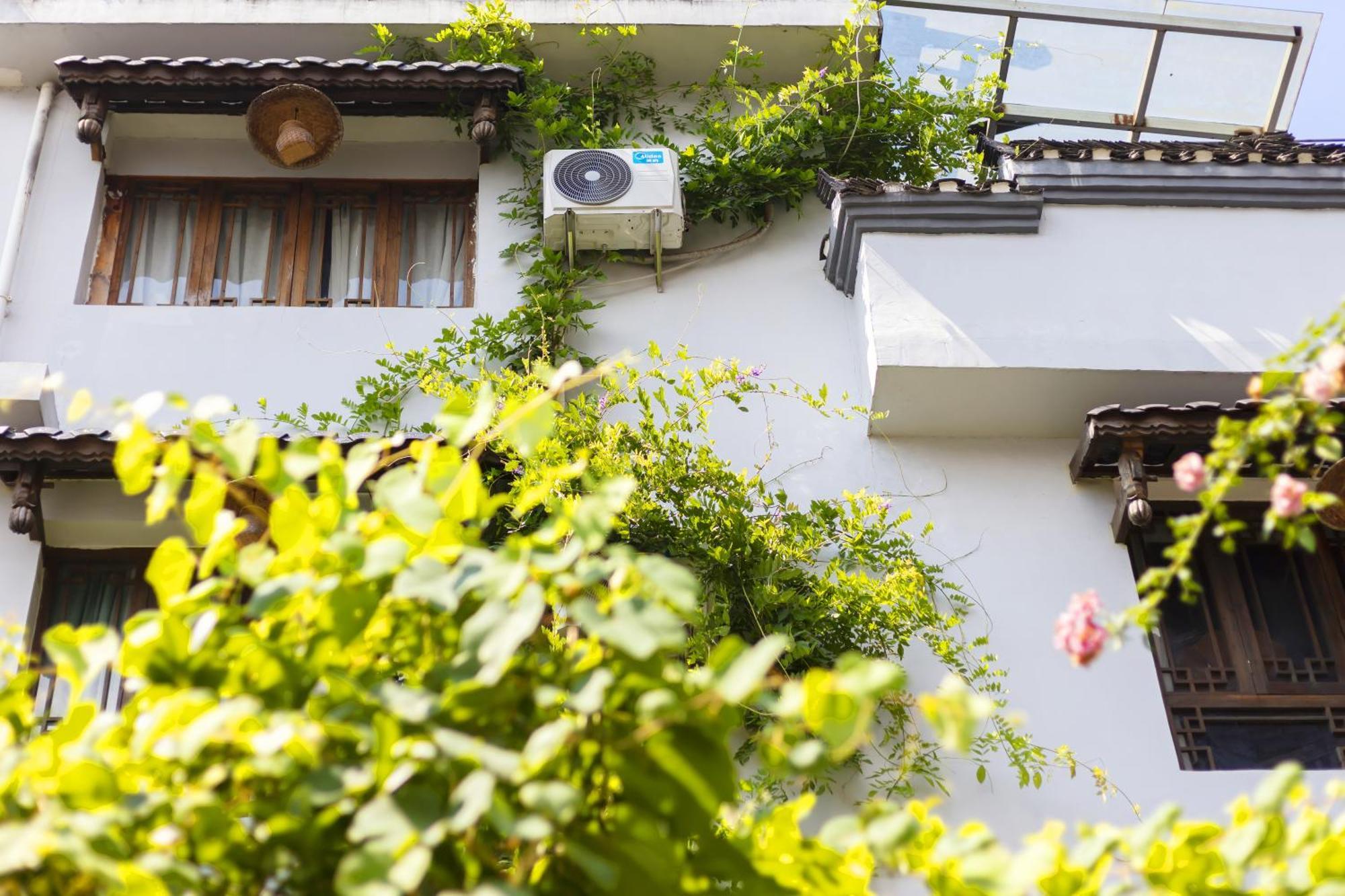 Butterfly Flowers Inn จางเจียเจี้ย ภายนอก รูปภาพ