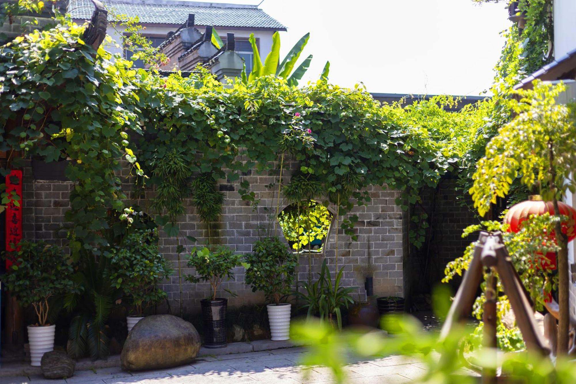 Butterfly Flowers Inn จางเจียเจี้ย ภายนอก รูปภาพ