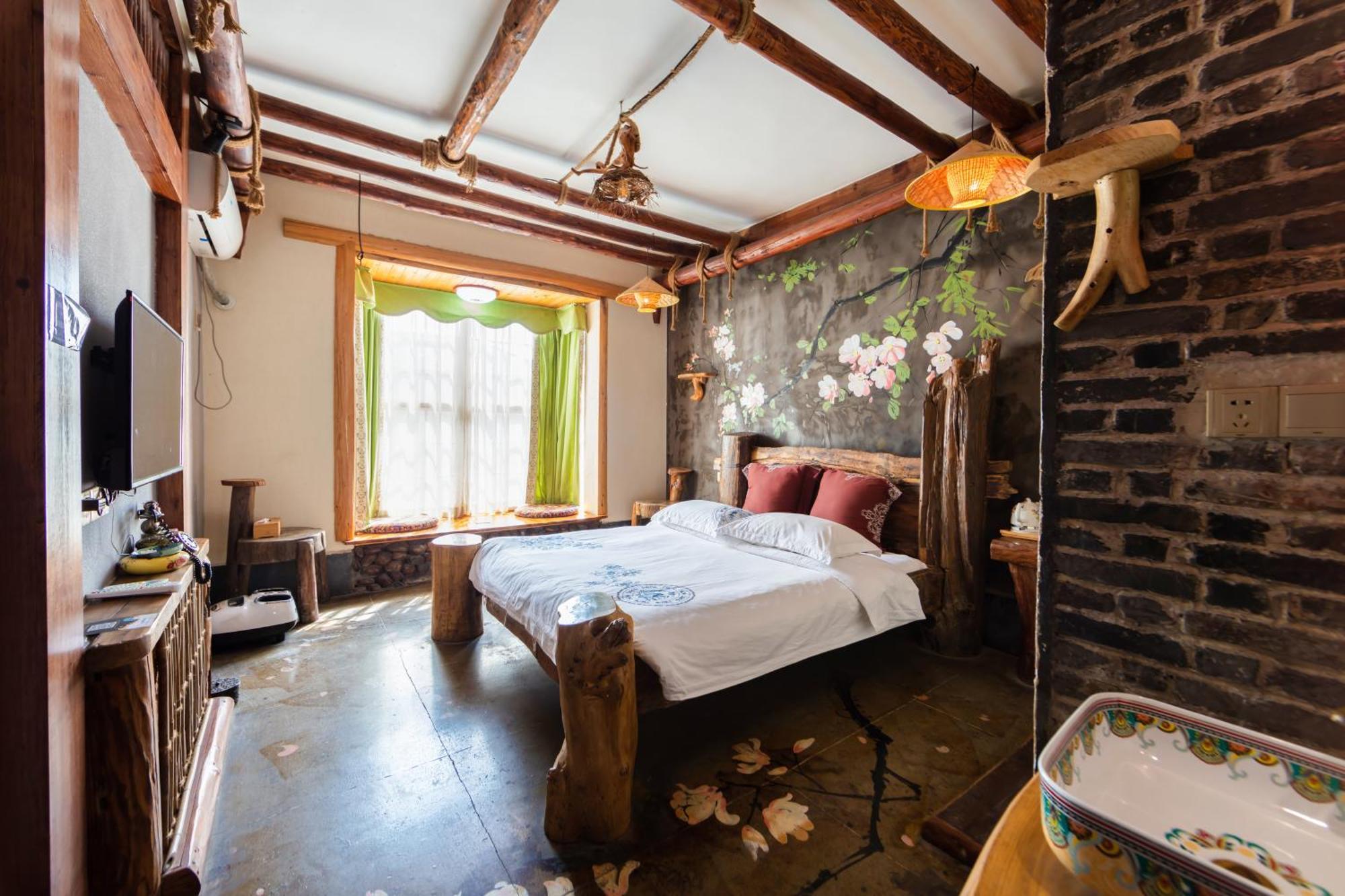 Butterfly Flowers Inn จางเจียเจี้ย ภายนอก รูปภาพ