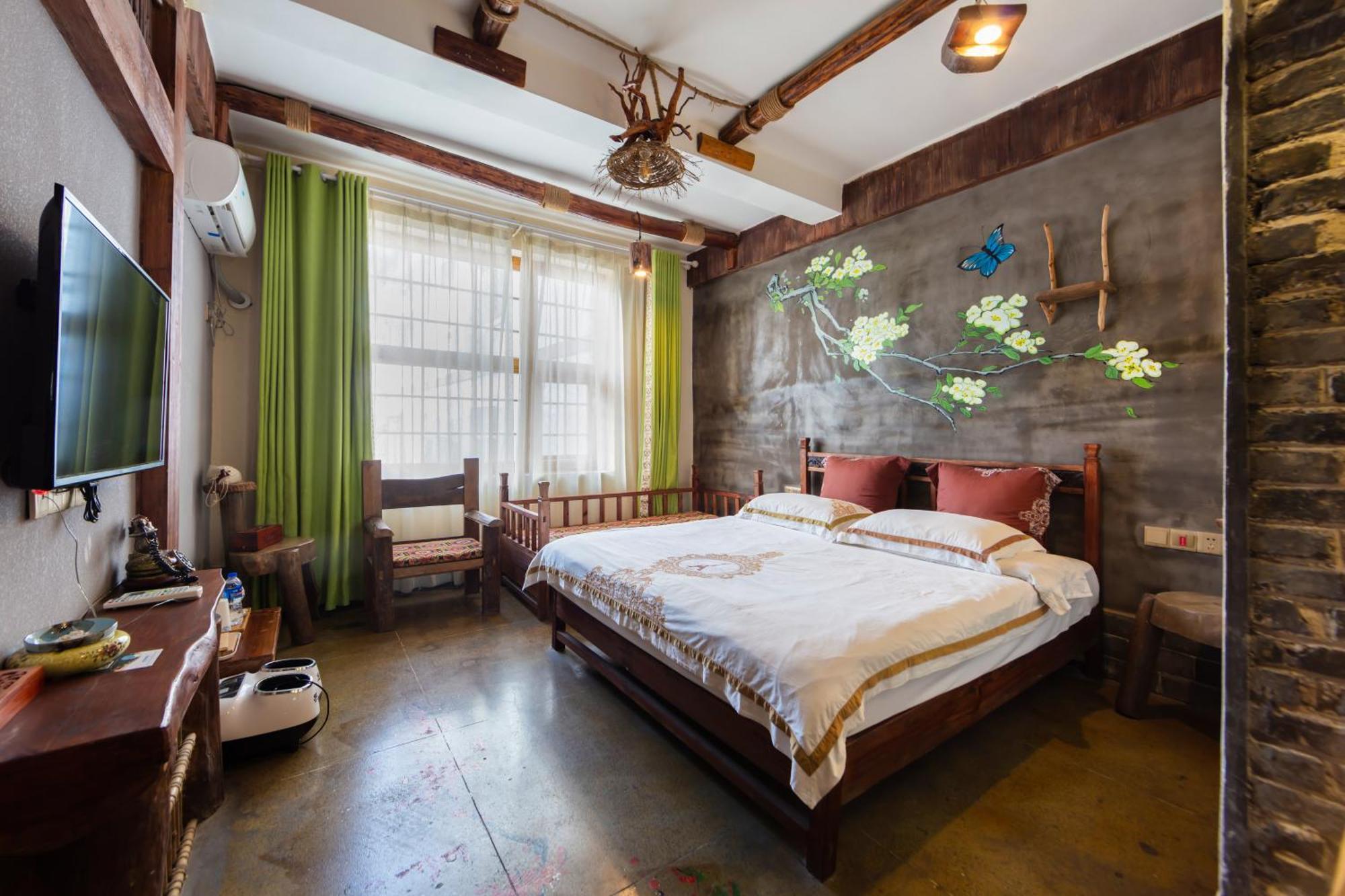Butterfly Flowers Inn จางเจียเจี้ย ภายนอก รูปภาพ