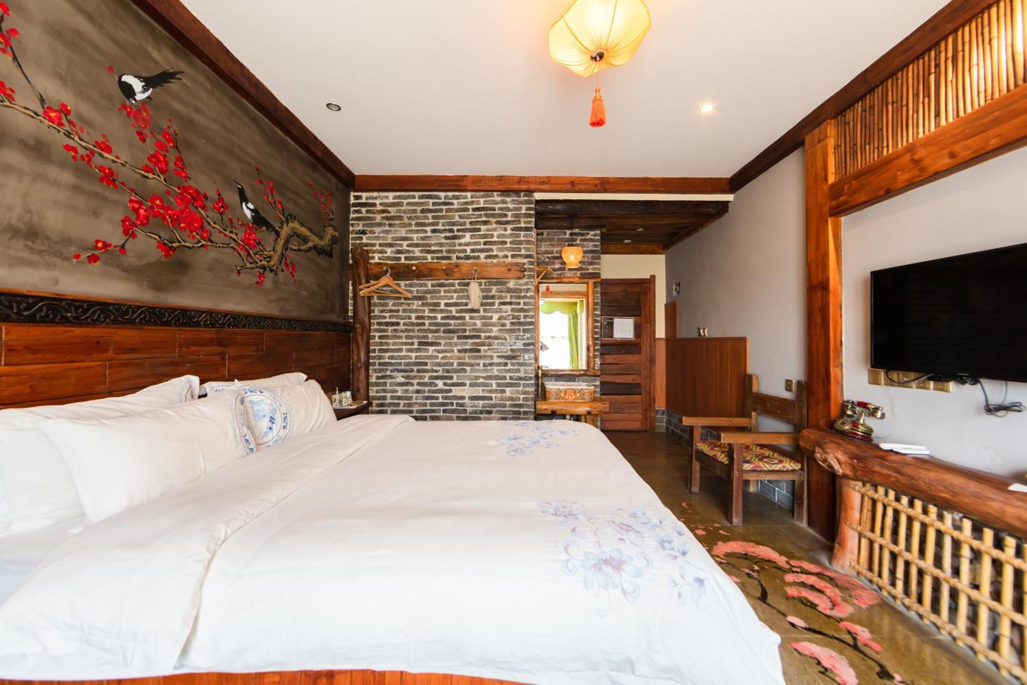 Butterfly Flowers Inn จางเจียเจี้ย ภายนอก รูปภาพ