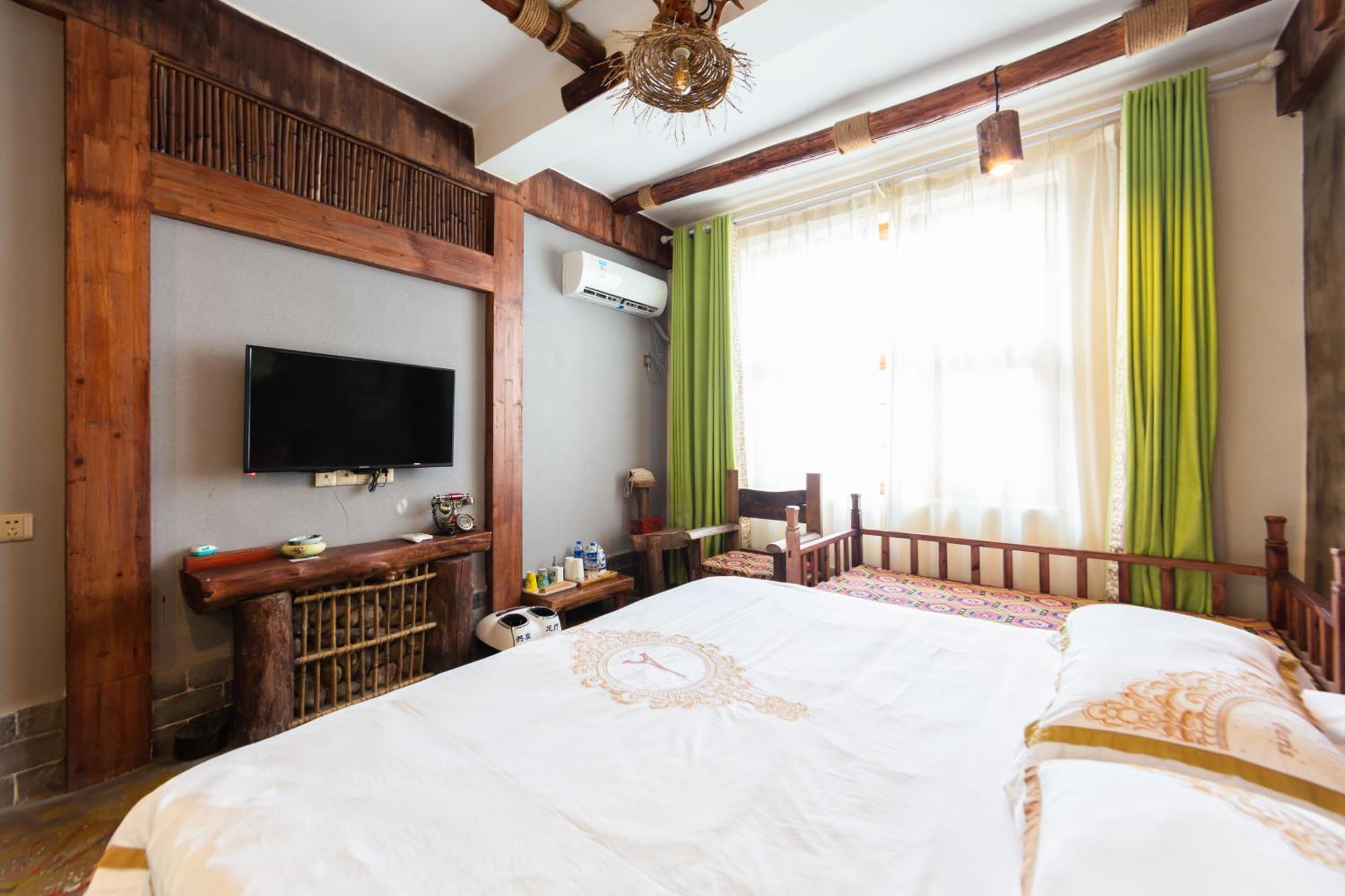 Butterfly Flowers Inn จางเจียเจี้ย ภายนอก รูปภาพ